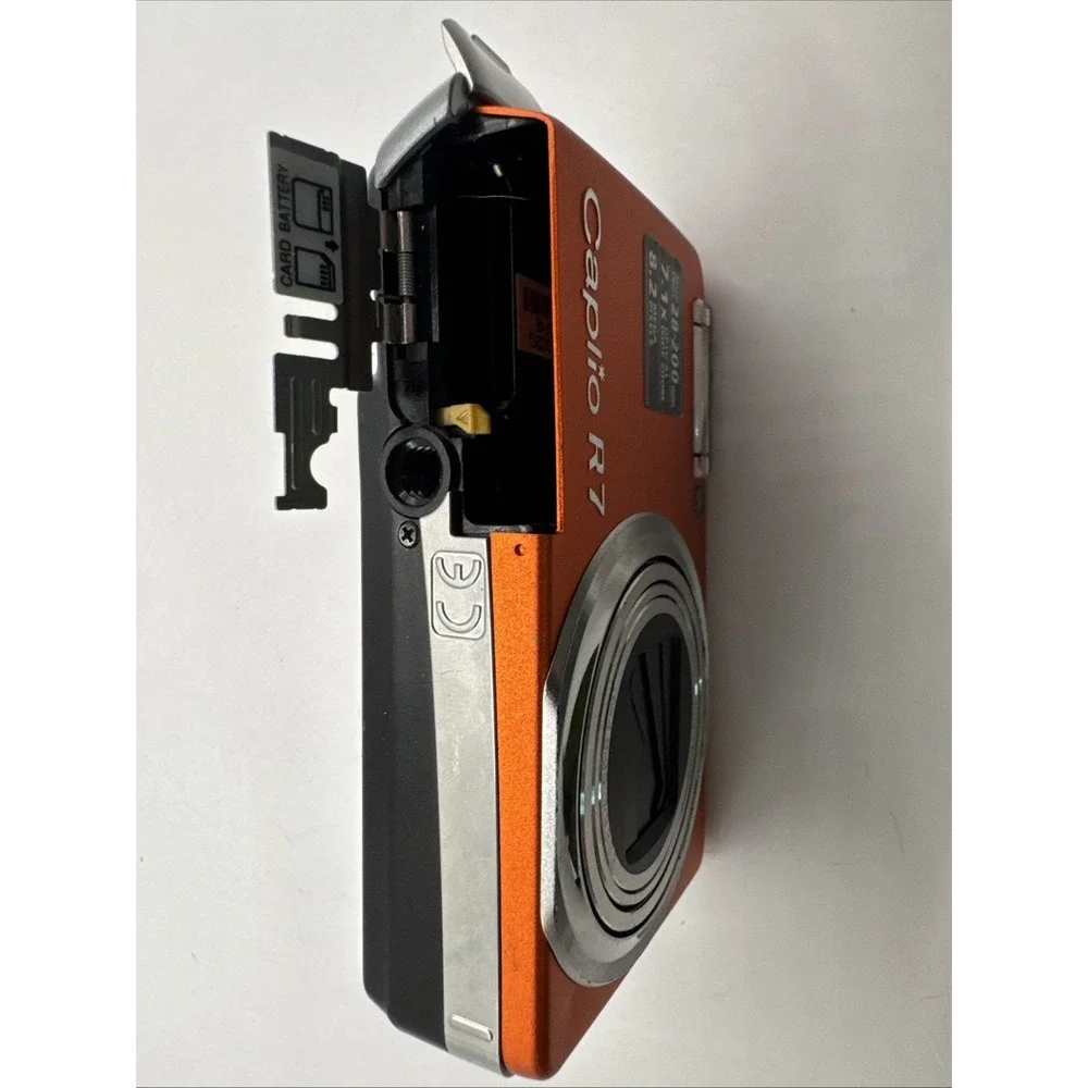 Caplio R7 Orange  shipping RICOH digital camera bodyBattery door broken